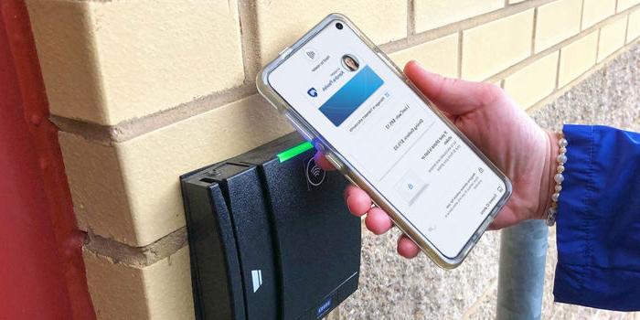 An Android device is opening an HFS door with mobile id+ card